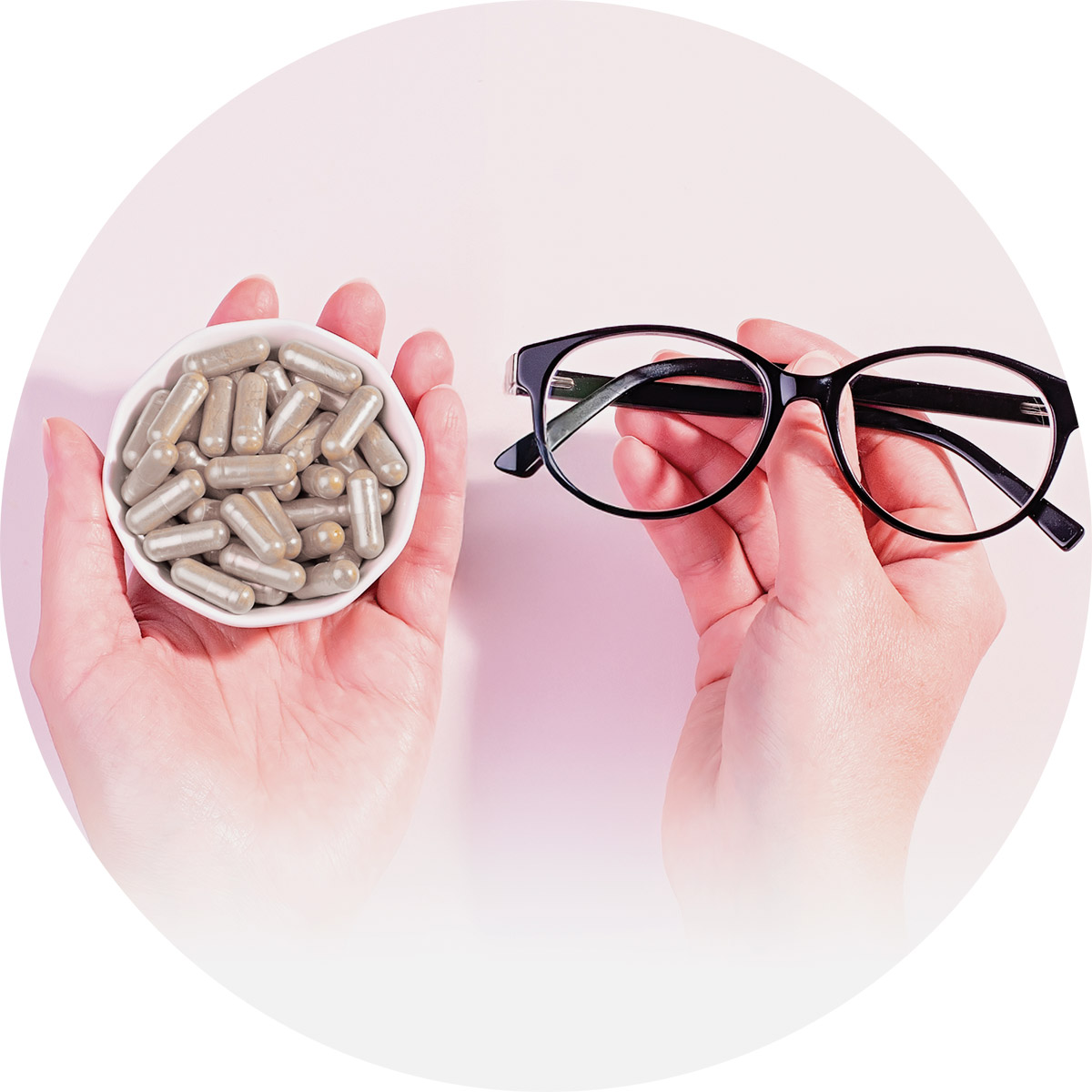 Someone holding supplements and glasses