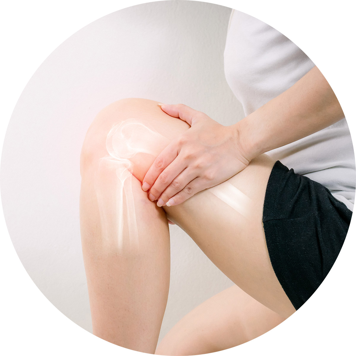 Person with an x ray image of a sore knee joint